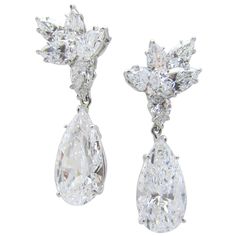 Platinum And Diamond Pendant Earrings By Harry Winston. Set With Two Pear-Shaped Diamonds 5.56ct, D- VS2 GIA # XXXXXX ) 5.05ct, D-VS2 (GIA # XXXXXX) Suspended By Clusters Of 12 Pear- Shaped Diamonds Weighing Approx. 5.00carat Color: E-F, Clarity: Vs. Pendants Detachable.Signed Harry Winston Luxury Silver Platinum Cluster Earrings, Harry Winston Diamond Earrings, Harry Winston Jewelry, Harry Winston Diamond, Platinum Pendant, Vintage Drop Earrings, Platinum Earrings, Earrings For Sale, Harry Winston