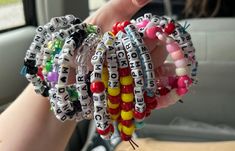 If you want to trade bracelets at your upcoming Clancy World Tour show but don't have the time to make them, I can help! I have a lot of bracelet materials and would love to make some for you so you can participate in the fun! Please let me know if you have preferences for certain albums, songs, jokes, references, lyrics, colors, etc. Please allow 1 day for every 10 bracelets you would like to ensure that you will get everything in time for your show! Twenty One Pilots Tour, Everything In Time, Bracelet Materials, Kandi Bracelets, One Pilots, Twenty One Pilots, Twenty One, World Tour, 1 Day