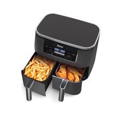 an air fryer with two trays full of fries and chicken strips in it