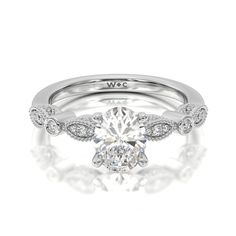 https://embed.imajize.com/1664051 Vintage Motifs, Elegant Engagement Ring, Vintage Diamond Wedding Bands, Vintage Art Deco Rings, Elegant Engagement Rings, Vintage Wedding Band, Gorgeous Engagement Ring, Cushion Cut Diamonds, Deco Ring