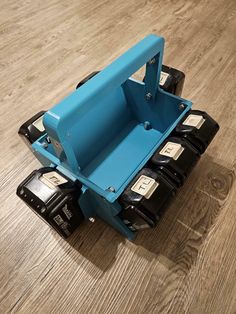 a toy dump truck sitting on top of a wooden floor