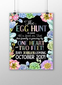 an egg hunt poster hanging on the wall with flowers and succulents around it