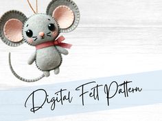 a felt mouse ornament hanging from a string with the words digital felt pattern below it