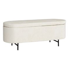 an upholstered bench with black legs and a white cover on the backrest