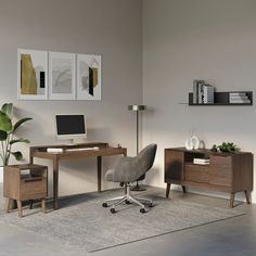 an office with a desk, chair and computer