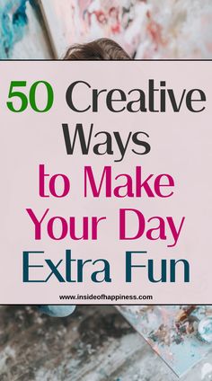 a person holding a sign that says 50 creative ways to make your day extra fun