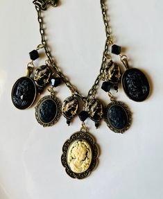 Victorian Style Gothic Mourning Cameos Bib Choker Necklace/gothic Cameo Draped Necklace - Etsy Handmade Black Steampunk Necklace, Black Metal Collectible Necklaces, Antique Black Metal Necklaces, Gothic Black Brass Jewelry, Antique Black Metal Necklace, Gothic Black Brass Necklace, Black Gothic Brass Jewelry, Black Gothic Brass Necklace, Black Antique Metal Necklace