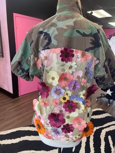 Biggest Trend of the season with the floral detailing on the back, makes them look as you walk away , loose style. Easy to pair with jeans or leggings. The flowers are like A 3D illusion popping off the jacket like a real garden effect. Vintage Camo , netted sheer back with floral detail . Trendy Summer Outerwear With Floral Print, Trendy Summer Floral Print Outerwear, Trendy Spring Outerwear With Short Sleeves, Trendy Short Sleeve Spring Outerwear, Trendy Short Sleeve Outerwear For Spring, Trendy Short Sleeve Summer Outerwear, Spring Floral Print Oversized Outerwear, Oversized Floral Print Spring Outerwear, Oversized Floral Print Outerwear For Spring