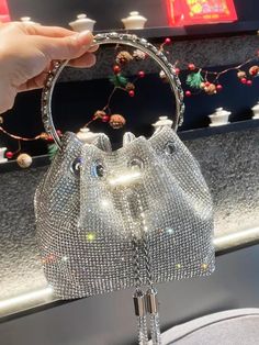 Composition: Metallic, Polyester Designer Style ID: GC43121223 Designer Purses And Handbags, Crystal Handbag, Bucket Purse, Crystal Clutch, Ring Handle, Clutch Purse Evening, Designer Shoulder Bags, Purses Designer, Evening Clutch Bag