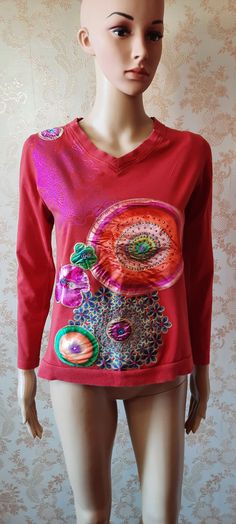 "Vintage Desigual sweatshirt, Red with coloured satin flowers and circles. It has long sleeves, the back is plain. It has a V neck and is in reasonable condition. Bust;   32\" Length;   22\" Inside sleeve;   17\" Made by DESIGUAL" Red Bohemian Top For Winter, Red Cotton Festival Top, Multicolor Long Sleeve Festival Top, Multicolor Long Sleeve Tops For Festival, Multicolor Long Sleeve Top For Festivals, Satin Flowers, Sweatshirt Vintage, Vintage Sweatshirt, Circles