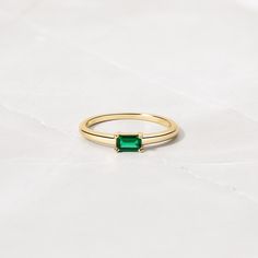 Beautifully crafted emerald ring is a true stunner! Looks great stacked or on its own! - - - D E T A I L S - - - * Made of 925 Sterling Silver * We use a THICK plating of 14k Gold or Rhodium * Available in sizes 4-10 * 3x5mm Baguette Stone * Nickel-free & Hypoallergenic - Will not turn your fingers green! * Made of the highest grade cubic zirconia for an authentic look! * Also available in White Cubic Zirconia https://www.etsy.com/listing/1327774787/baguette-ring-dainty-stacking-ring?click_key=1 Green Emerald Cut Stackable Rings For May Birthstone, Classic Green Emerald Cut Stackable Rings, Classic Green Emerald-cut Stackable Rings, Green Baguette Cut Stackable Rings, Green Emerald Open Ring Stackable Rings, Classic Green Emerald Stackable Rings, Green Emerald Stackable Open Rings, Stackable Emerald Cut Emerald Birthstone Ring, Green Emerald-cut Stackable Rings