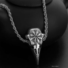 a necklace with an animal skull on it