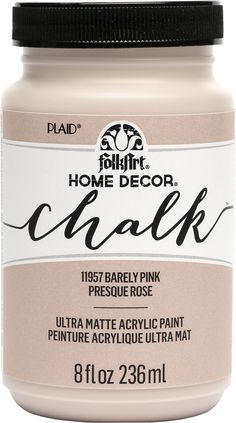 a jar of chalk that is white and brown