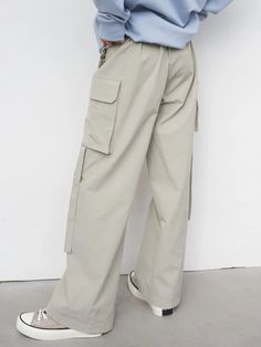 These stylish Casual High Waist Flap Pocket Side Cargo Pants are made from a durable non-stretch fabric, these pants feature a natural waistline, zipper fly closure with button detail, and practical side flap pockets. The regular fit and long length make these cargo pants perfect for any casual occasion. Made with Polyamide and Spandex for a comfortable feel. Upgrade your wardrobe with these versatile cargo pants. Detail: Style: Casual Pattern Type: Plain Type: Cargo Pants Closure Type: Zipper F High Waist Beige Cargo Pants For Streetwear, Solid Straight Leg Cargo Pants With Belt Loops, Solid Color Straight Leg Cargo Pants With Belt Loops, Beige Cargo Pants With Pockets For Fall, Urban Bottoms With Pockets For Workwear, Baggy Khaki Bottoms With Flap Pockets, Beige High-waisted Utility Pants, Beige High-waisted Pants With Side Pockets, Beige Trousers With Side Pockets