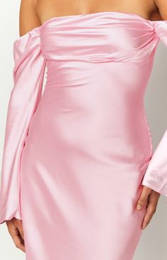 Pink Long Sleeve Maxi Dress   HOW TO STYLE: This timeless maxi dress is guaranteed to turn heads. Perfect for your next formal event paired with dainty jewellery and clutch.   FEATURES: Maxi length Off the shoulder Long sleeve Lined Satin material Mid-weight  Ruched bust Back zip Bias cut Fitted Satin Long Sleeve Party Dress, Long Sleeve Midi Dress For Evening Wedding, Long Sleeve Evening Midi Dress For Wedding, Elegant Pink Ruched Mini Dress, Off-shoulder Satin Maxi Dress For Formal Occasions, Fitted Feminine Maxi Dress For Prom, Feminine Fitted Maxi Dress For Prom, Chic Ruched Maxi Dress For Wedding Guest, Long Sleeve Midi Dress For Prom Season