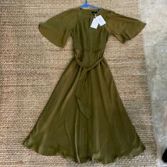 This Item Is Brand New Never Worn With Tags Silk A-line Dress For Brunch, Elegant Olive Dress For Formal Occasions, Elegant Olive Formal Dress, Fitted Olive Maxi Dress For Spring, Spring Workwear Silk Maxi Dress, Elegant Olive Maxi Dress For Spring, Spring Silk Maxi Dress For Work, Chic Olive Maxi Length Dress, Maxi Length Silk Dress For Work In Spring