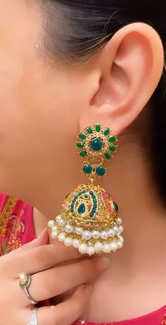 We bring beautiful Jewelry sure to elevate any look! Kindly pay attention to all photos and video and ask questions about the item prior to ordering. Green Jhumkas For Wedding And Eid, Traditional Green Jhumkas For Wedding, Elegant Green Chandbalis For Eid, Emerald Earrings For Wedding And Festivals, Gold Plated Green Jewelry With Latkans, Green Peacock Design Jhumkas For Diwali, Green Peacock Jhumkas For Diwali, Diwali Green Jhumkas With Peacock Design, Traditional Green Jhumkas For Eid