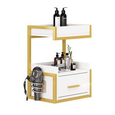 a white and yellow shelf with some bottles on it's sides next to a sink