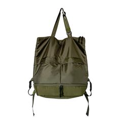 an olive green tote bag with straps