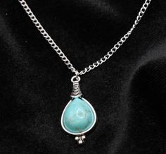 Handmade Tibetan Silver Waterdrop synthetic Turquoise pendant necklace with chain. This gorgeous necklace is something truly lovely you could wear every day. A lovely gift for that special someone. Matching turquoise water drop earrings available from our shop.  Made with  ⭐ Tibetan silver waterdrop synthetic turquoise charm (measures 32x15mm) ⭐ 18 inch,20 inch or 22 inch silver plated curb chain Item will be sent on a decorative card and wrapped in tissue paper before posting Please do not wear Turquoise Drop Jewelry Gift, Turquoise Drop Jewelry As A Gift, Turquoise Teardrop Metal Jewelry, Nickel-free Turquoise Teardrop Pendant Necklace As Gift, Nickel-free Teardrop Turquoise Necklace As Gift, Nickel Free Turquoise Teardrop Pendant Necklace For Gift, Turquoise Drop Necklace For Jewelry Making, Handmade Turquoise Drop Necklaces, Handmade Turquoise Drop Necklace