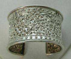 (eBay) Vintage 1-3/4" Wide Sterling 925 Floral Repousse Cuff Bracelet 53.1 NF Thailand Classic Cuff Bracelet With Intricate Design For Anniversary, Classic Formal Cuff Bracelet With Intricate Design, Classic Intricate Cuff Bracelet For Formal Occasions, Elegant Cuff Bracelet With Intricate Design For Formal Occasions, Elegant Cuff Bracelet With Intricate Design For Formal Events, Elegant Wide Band Cuff Bracelet For Formal Occasions, Elegant Hallmarked Sterling Silver Bracelet For Ceremonial Use, Elegant Hallmarked Sterling Silver Bracelet For Ceremonial Occasions, Classic Wedding Cuff Bracelet With Intricate Design