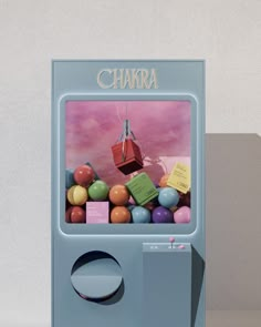 an old fashioned arcade machine with lots of candy