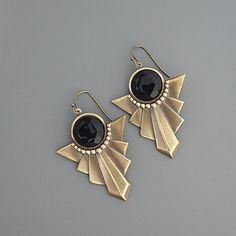 "Vintage Jewelry - Vintage Earrings - Art Deco Earrings - Brass Earrings - Black Earrings - Chloe's Vintage Jewelry - handmade jewelry So gorgeous!  Elegant vintage brass Art Deco earrings embellished with a chic black faceted glass stone. I do offer a matching necklace. Chloe says, \"Wear them and feel fabulous!\" They measure 2 1/4\" long from the top of the ear wire. Thanks for visiting Chloe's Vintage Jewelry" Art Deco Round Pierced Earrings, Black Art Deco Earrings For Evening, Bronze Metal Jewelry For Evening, Antique Black Pierced Earrings, Antique Black Earrings For Gift, Antique Style Black Earrings For Gift, Art Deco Jewelry With Matching Earrings For Gifts, Handmade Art Deco Silver Earrings, Art Deco Jewelry With Matching Earrings As Gift