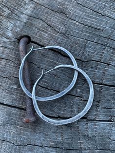 These hoops are PERFECTLY rustic like a set of modern day artifacts. They compliment an style, be it BOHO, minimalist or professional. These aren't commonplace prefab hoops because each one is crafted by hand with love but they WILL be your new favorite for everyday wear! MORE SIZES AVAILABLE HERE: https://www.etsy.com/listing/772693798/large-sterling-silver-hoop-earrings-in?ref=shop_home_active_1&pro=1&frs=1 All jewelry from my studio is endowed with a lifetime craftsmanship guarantee & Oxidized Circle Hoop Earrings As Gift, Gift Oxidized Finish Small Hoop Earrings, Small Metal Hoop Earrings With Soldered Detail, Small Hoop Metal Earrings With Soldered Details, Adjustable Soldered Hoop Earrings For Gifts, Gift Circle Hoop Earrings With Oxidized Finish, Adjustable Oxidized Finish Hoop Earrings, Adjustable Oxidized Hoop Earrings, Adjustable Small Hoop Earrings With Oxidized Finish