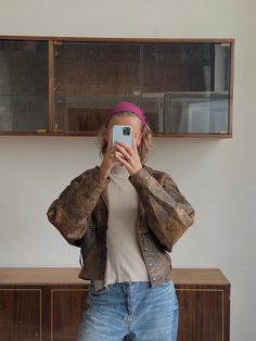 Vintage 80s distressed leather bomber jacket in brown, 100% genuine leather, polyester lining, It has a worn-in appearance, with visible creases and a matt finish. Fits S-L, narrower on the hips zone, the jacket features a structure design low pointed collar, front button closure, and slightly oversized sleeves, giving it a rugged, grungy and edgy look. Overall good vintage condition. Measurements: Shoulders - 60cm / 23.6" Sleeve - 63cm / 24.8" Length - 75cm / 29.5" Bust from armpit to armpit - Vintage Brown Distressed Outerwear, Vintage Distressed Brown Outerwear, Distressed Rugged Brown Outerwear, Rugged Distressed Brown Outerwear, Distressed Brown Leather Jacket With Long Sleeves, Brown Distressed Leather Jacket With Long Sleeves, Distressed Brown Outerwear For Fall Streetwear, Vintage Brown Leather Jacket For Streetwear, Retro Distressed Brown Leather Jacket For Fall