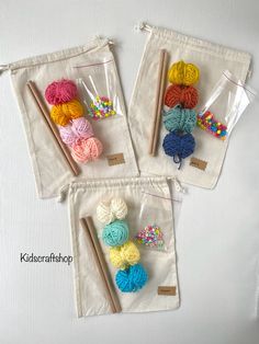 three bags filled with balls of yarn and crochet hooks next to each other