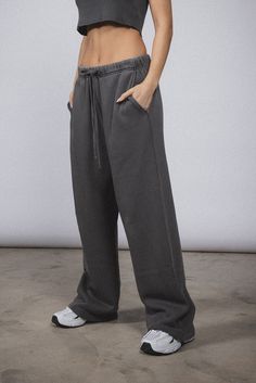 An elevated loungewear essential. The Core Straight Leg Sweatpant is made of a 12 oz cotton with a wide-leg, baggy silhouette. Includes a drawstring waistband, side pockets, and back pocket for added functionally. 100% ORGANIC COTTON 12 OZ BRUSHED TERRY STANDARD FIT MID RISE GARMENT WASHED INSPIRED BY VINTAGE GARMENTS Loose Fit Drawstring Sweatpants For Lounging, Gray Sweats With Elastic Waistband For Streetwear, Loosely Fitted Sweatpants With Drawstring For Loungewear, Full-length Drawstring Sweatpants For Loungewear, Full Length Drawstring Sweatpants, Loosely Fitted Full Length Sweatpants With Drawstring, Oversized Solid Sweatpants With Pockets, Baggy Full-length Drawstring Sweatpants, Solid Color Relaxed Fit Sweatpants With Drawstring