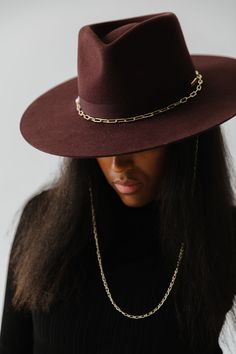 Think of the Raine as three hats in one. The removable paperclip brass chain features three pearls, + our first ever chain chinstrap can stay clipped into the hat or not, it’s totally up to you. Strip the Raine down to its basic form, the wide brim fedora, to showcase a hand-sewn grosgrain band with the gold Gigi Pip bar. This is a hat is for the woman who loves options. Style - Wide Brim Fedora Dimensions - Crown: 13 cm Brim: 10 cm Material - 100% Australian Wool + Gold Plated Metal Chain + Fau Stylish Womens Hats, Classy Hats, Hat Size Chart, Head Ties, Head Wear, Rugged Style, Halo Style