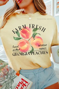 Dive into summer with farm-fresh georgia peaches, indulge in the softness of a Comfort Colors t-shirt. Whether paired with shorts for a beach day or dressed up with a skirt for a sunset soirée, this summer staple exudes both comfort and farmcore flair. 𝔻𝔼𝕋𝔸𝕀𝕃𝕊 Comfort Colors 1717 T-Shirt 💗Fabric content: 100% Cotton 💗Feel: luxe thick garment-dyed cotton 💗Fit: oversized unisex fit - Models are wearing XL Gildan 5000 T-Shirt 💗Fabric content: 100% Cotton; heathered colors have added polyester 💗Feel: tubular jersey knit cotton 💗Fit: standard unisex fit - Models are wearing L ➡️Direct to Garment Printing uses ink jet technology to spray ink onto garments for a strong bond between the ink and fibers. ➡️Kindly note that colors, contrast, textures and positions of graphics can slightl Peach Short Sleeve T-shirt For Summer, Peach Short Sleeve Top For Brunch, Spring Graphic Tee For Brunch, Spring Brunch Graphic Tee Shirt, Spring Brunch Graphic Tee T-shirt, Summer Peach T-shirt With Graphic Print, Spring Brunch Graphic Tee, Peach Cotton Tops For Brunch, Summer Brunch Cotton T-shirt