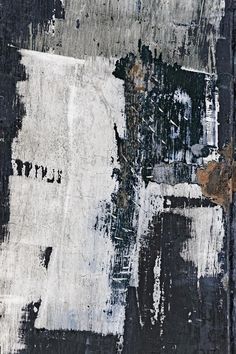 an abstract painting with black, white and grey colors on it's surface that says limit