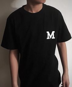 T-shirt with initial  Black t-shirt with white initial/ White t-shirt with black initial Initial A-Z (Regular or Calligraphy) Send message to seller for choice of initial and the type (regular or calligraphy) Casual Black T-shirt With Monogram Print, Casual Crew Neck T-shirt With Monogram Print, Basic Black T-shirt With Letter Print, White Monogram Crew Neck T-shirt, Streetwear Monogram Print Short Sleeve T-shirt, Short Sleeve Monogram Print T-shirt For Streetwear, Monogram Print Short Sleeve T-shirt For Streetwear, Casual Monogram Print Crew Neck T-shirt, Tan Graphic Tee With Text Print