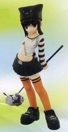 a figurine is dressed in black and white