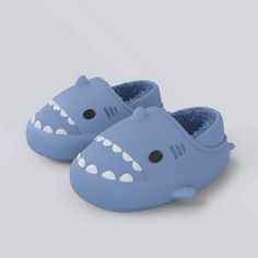 " This Winter, Snowmen Wear Shark Slippers! SHARKY'Z™️ Shark Slippers are the most adorable gift to bring warmth and joy to your little child during the Holiday season. These shark slippers are very soft and suitable for any daily activity. As a new upgrade feature, they are designed with stretchy pliable heel-strap to fit perfectly every child's foot shape or size and stay on their feet. But most importantly, they're so attractive that your child will never take them off! FLEXIBLE EVA SOLE Exce Slippers For Kids, Shark Slippers, Kids Flip Flops, Affordable Shoes, Cute Shark, Winter Slippers, Kids Slippers, Cold Night, Baby Slippers