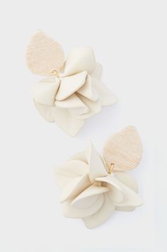 Cream Silk and Leather Orchid Earring Modern White Clip-on Jewelry, White Chic Clip-on Jewelry, Chic White Metal Earrings, Chic White Dangle Clip-on Earrings, Chic Clip-on Earrings, Chic White Metal Jewelry, Chic White Flower Earrings, Chic Cream Jewelry For Party, Chic White Dangle Hoop Earrings