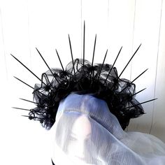 This wonderful Black gothic halo crown will make you the center of a festival or Halloween party. The height of the spikeds Spider goth headpiece is about 7 inches (17.5 cm).  Crown spikes vampire cosplay headband are made of wood. Spikes are securely creased to the headband with felt. The Vampire cosplay headband is decorated with rhinestone chain and acrilic spider. Each part is securely fastened with felt. ATTENTION! The ends of thorns are sharp! Be careful with the people around you while using this crown. The store is not responsible for accidents. More of my burning man headpiece you can see here https://www.etsy.com/ru/shop/byIraFomina?ref=hdr_shop_menu&section_id=28075148 Address to me on any question. I will be happy to help you. Vampire Hair Accessories, Gothic Headpieces For Cosplay And Festivals, Gothic Costume Accessories For Party And Cosplay Events, Black Costume Hats And Headpieces For Masquerade And Cosplay, Gothic Costume Hats And Headpieces For Cosplay, High Crown Costume Accessories For Halloween Party, High Crown Halloween Costume Accessories For Costume Party, Gothic Headpiece For Costume Party, Gothic Headpiece For Masquerade And Cosplay Events