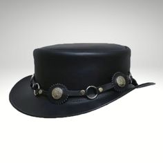 Black Short Top Hat is made from genuine leather and is perfect for keeping you cool and comfortable.  We have designed the sleek and streamlined Black Leather Top Hat to be perfect for those who prefer a simpler look.  Cowhide suede, a narrow self-leather hat strap adorns the short pointed crown. Its wide edges flare up from the sides. This product is handmade with cowhide leather and is produced by experienced craftsmen.  This product is both stylish and durable. Our products are of the highes Leather High Crown Top Hat For Rodeo, Fitted Black Leather Top Hat, Black Leather Hat For Outdoor, Black Western Hat With Leather Sweatband, Adjustable Leather Hat Bands For Outdoor, Black Leather Hat With High Crown, Black Leather Hat Bands For Rodeo, Black Leather Brimmed Top Hat, Classic Black Leather Hat Bands