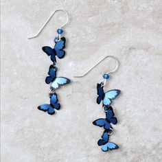 How cute are these delicate Blue Morpho Kaleidoscope butterfly earrings? Each pair is meticulously hand painted, and made with love, which is the best combination, right? • Made and hand-painted in the USA• Sterling silver earring wires Want to see other cute earrings like the Blue Morpho Kaleidoscope Butterfly Earrings? Browse our cute earring category! Kaleidoscope Butterfly, Folded Wings, Romantic Jewelry Gift, Butterfly Dangle Earrings, Romantic Jewelry, Blue Morpho, Romantic Jewellery, Girly Accessories, Colorful Earrings