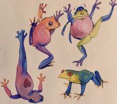 three different colored lizards on white paper