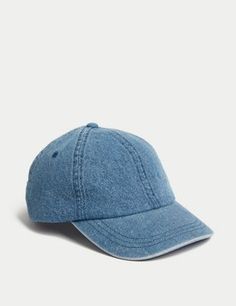 a denim cap with an unstreted visor on the front and side