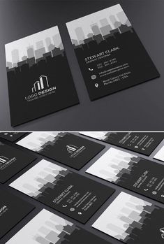 the business card is designed to look like it has black and white cityscape