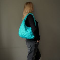 "Green mint hobo bag quilted nylon.  Height:30 cm  ( 11,81 \" ) Width:40 cm  ( 15,74 \" ) Depth:13 cm    ( 5,11 \" ) Handle:  54 cm  ( 21,25 \" ) This hobo bag is made of green mint quilted nylon fabric. Green mint hobo bag has cotton lining, 1 pocket inside, fastens with magnetic button. Nylon green shoulder bag fashion for woman. Light green hobo bag quilted unisex. Light green handbag fashion for women. Mint green shoulder bag puffer for women. City style hobo bag green mint color. Unique green hobo bag handmade. Medium size hobo bag for woman. Green pouch quilted nylon street style. Minimalist green hobo bag. Green purse hobo bag medium size." Green Quilted Shoulder Bag For Travel, Quilted Green Shoulder Bag For Travel, Green Quilted Bag For Travel, Everyday Green Quilted Bag, Everyday Quilted Hobo Shoulder Bag, Casual Green Quilted Bag, Green Quilted Bag For Daily Use, Green Nylon Shoulder Bag For On-the-go, Green Quilted Shoulder Bag