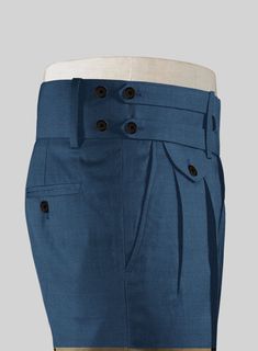 Bring some classic dignity, sophisticated style and warm touch to your work week wardrobe with our Napolean Casa Blue Double Gurkha Wool Trousers. Crafted from wool blend, a longlasting piece with remarkable comfort and feel which complements the incredible versatility offered by its blue hue.  Look Includes   Napolean Casa Blue Wool Fabric  Cross Pocket  Two Pleated Front  Double Button Fastening Wide Waistband  Diamond Pocket On Right  1.5inch Trouser Cuffs  Two Welted Back Pockets on Trousers    Click 'Customize Now' to modify the look if needed.   Lining: Viscose, Dry Clean, Pants can be lightly washed. Kaunda Suit, Fabric Cross, Mens Pants Fashion, Wool Trousers, Work Week, Blue Wool, Wide Waistband, Wool Fabric, Blue Hues