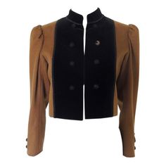 This is a vintage YSL Rive Gauche brown wool jacket. I believe this is a "Russian Collection" piece, late 1970s. The jacket has puff sleeves, Mandarin collar and black Passementerie trim. I believe this is wool with velvet paneling. The jacket is tagged size 36. Made in France. The jacket is in fair vintage condition. While the jacket body, trim, and velvet panels are in good condition, there are issues with several of the buttons and their net coverings. One cuff is missing one button, and the Ysl Rive Gauche, Dream Wishlist, Style Moodboard, Vintage Yves Saint Laurent, Body Trim, Vintage Ysl, Bolero Jacket, Russian Fashion, Rive Gauche