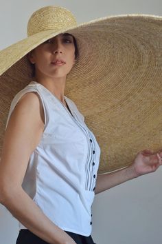 The queen of all hats, hand made to your measure of 100% natural Spanish wheat straw (absolutely the best quality you can find on the market). Pure luxury and absolutely unique! Diameter: cca 90 cm Traditional Natural Straw Hat For Spring, Traditional Summer Straw Hat With Curved Brim, Traditional Palm Leaf Straw Hat For Summer, Traditional Wide Brim Straw Hat For Summer, Elegant Beige Handwoven Straw Hat, Traditional Natural Sun Hat For Summer, Traditional Natural Color Sun Hat For Summer, Handmade Elegant Natural Straw Hat, Elegant Handmade Natural Straw Hat