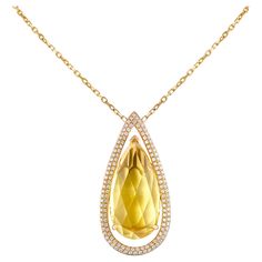 Gorgeous gemstones by Sunita Nahata... This collection features unique fancy cut color gemstones that are truly one of a kind and exclusive to Sunita Nahata Fine Design. This necklace features a stunning pear shaped Lemon Quartz with a fancy cut. Boasting bold colors the gemstone is accented with diamonds set on a gold frame. Lemon Quartz Necklace with Diamond in 18 Karat Yellow Gold Lemon Quartz: 23.7 carat, 30X15mm size, pear FTC shape. Diamonds: 0.891 carat, round shape, G colour, VS clarity. Lemon Necklace, White Diamond Necklace, Necklace With Diamond, Gold For Sale, Yellow Gold Necklace, Tree Necklace, Elegant Pendant, Naha, Lemon Quartz