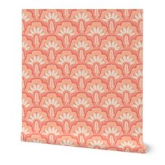 an orange and white wallpaper with large flowers on the front, in shades of pink